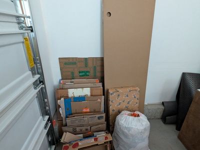 Assorted Cardboard Boxes and Packing Materials for Moving or Storage