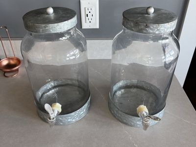 Two Decorative Glass Beverage Dispensers with Spigot