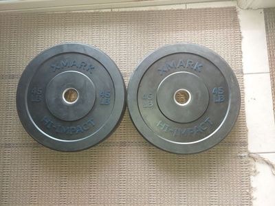 pair of 45lb xmark hi-impact bumper plates