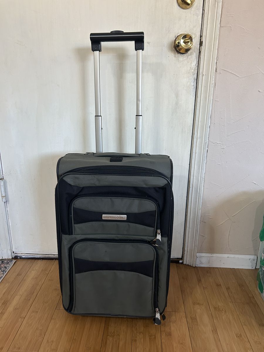 Gray Carry on luggage w/wheels & handle
