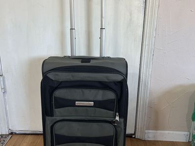 Gray Carry on luggage w/wheels & handle