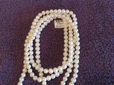 Strand of Fine Cultured Pearls 54"