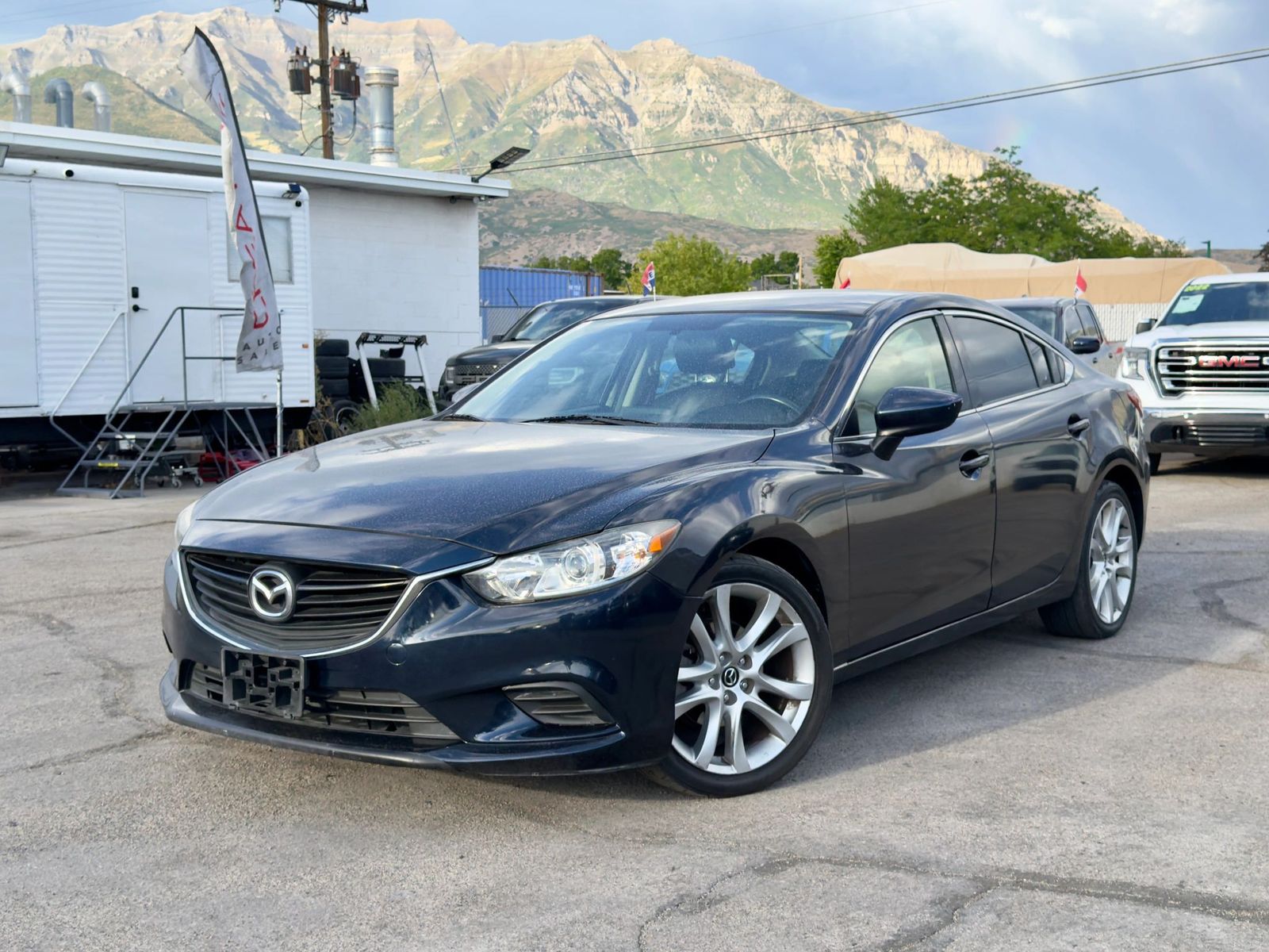 2016 Mazda Mazda6 i Touring — rebuilt & branded title, 17% below market
