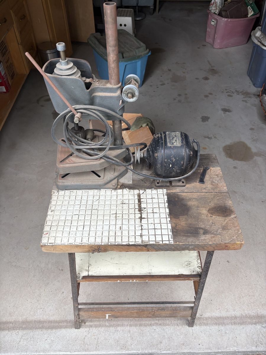 Belt driven drill press