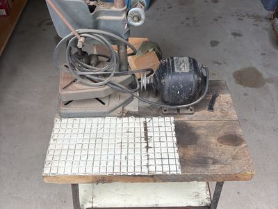 Belt driven drill press