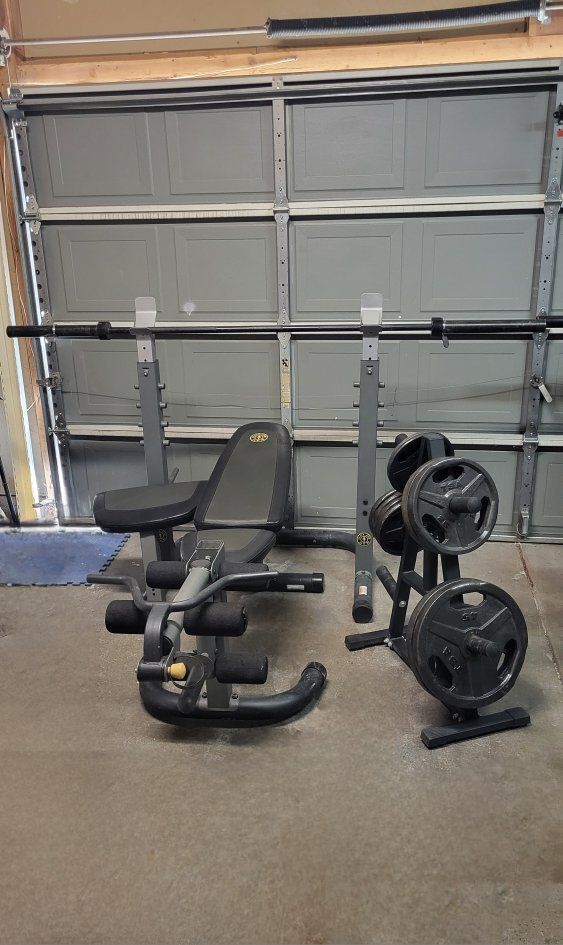 Bench and 195 pounds of weights