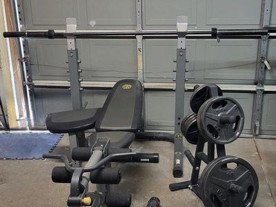 Bench and 195 pounds of weights