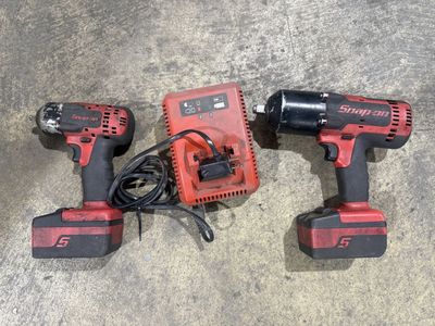 Snap on 1/2 and 3/8 impact guns with batteries
