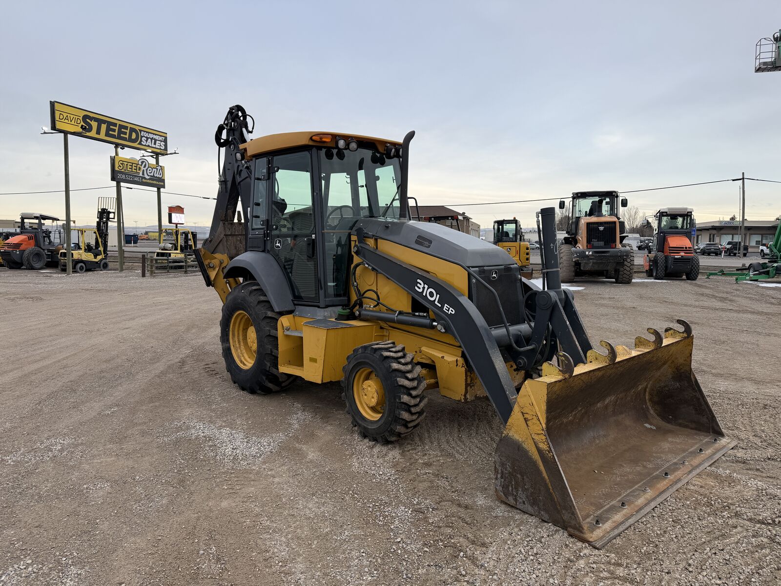 2020 John Deere 310L EP- Stock: 11421