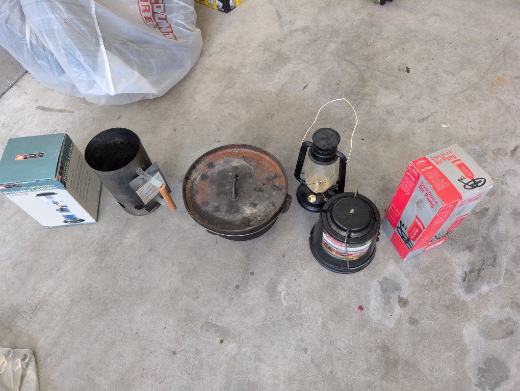 camping gear. lanterns Dutch oven chimney starter dual action pump