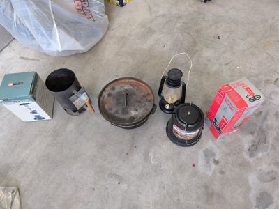 camping gear. lanterns Dutch oven chimney starter dual action pump