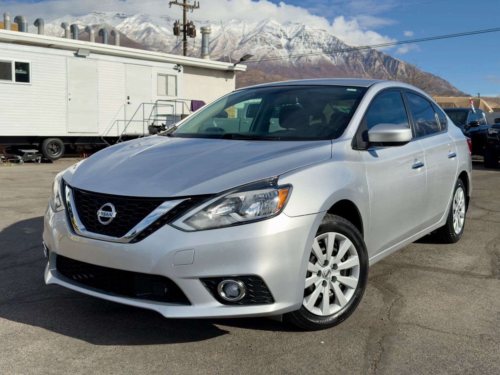 2019 Nissan Sentra S — rebuilt & branded title, 24% below market