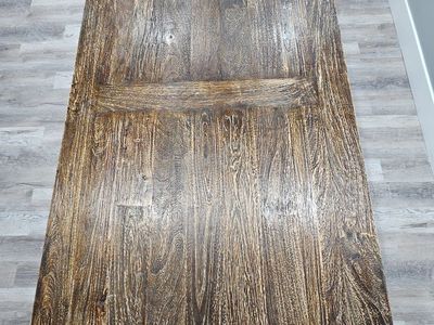 Rustic Dark Wood Trestle Dining Table with Extension Supports