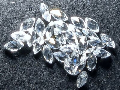 WHITE SAPPHIRE MARQUISE CUT. (4 PIECES, 60ctw)