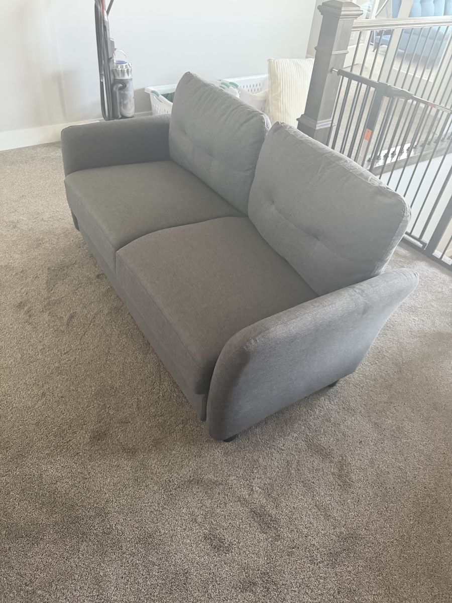 Lightly used grey loveseat sofa