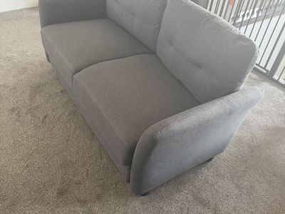 Lightly used grey loveseat sofa