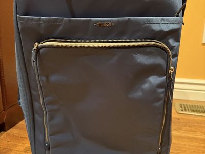 Tumi wheeled carry on suitcase, lightly used and in very good condition!