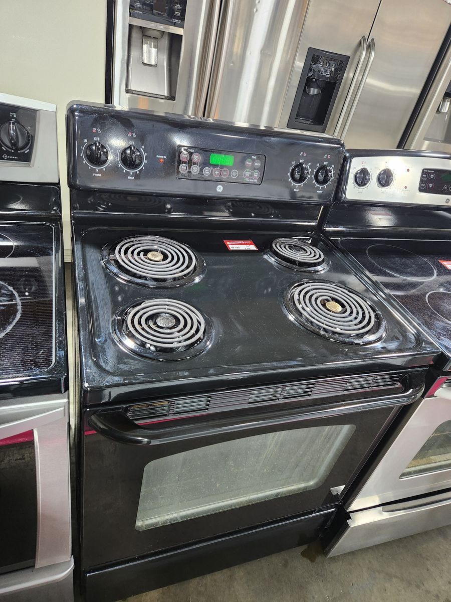 LOW PRICE GUARANTEED! GE COIL TOP RANGE!