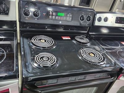 LOW PRICE GUARANTEED! GE COIL TOP RANGE!