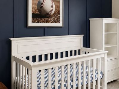 White Wooden Baby Crib with Slatted Sides