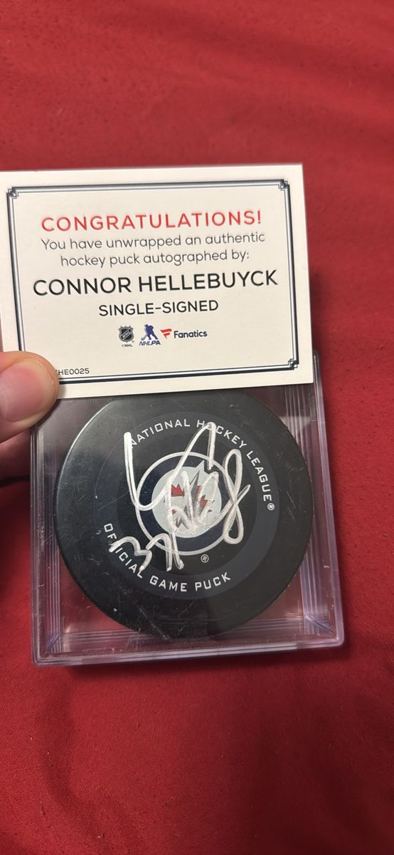 Connor Hellebuyck Autographed NHL Official Game Puck - Fanatics Authentic Signed Hockey Memorabilia