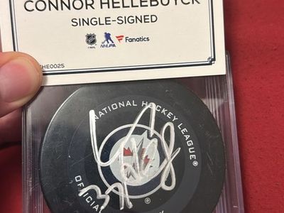 Connor Hellebuyck Autographed NHL Official Game Puck - Fanatics Authentic Signed Hockey Memorabilia
