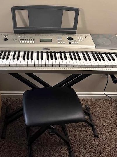 Yamaha YPG-235 Piano/ keyboard Portable Grand with music holder, pedal, stand, and bench.