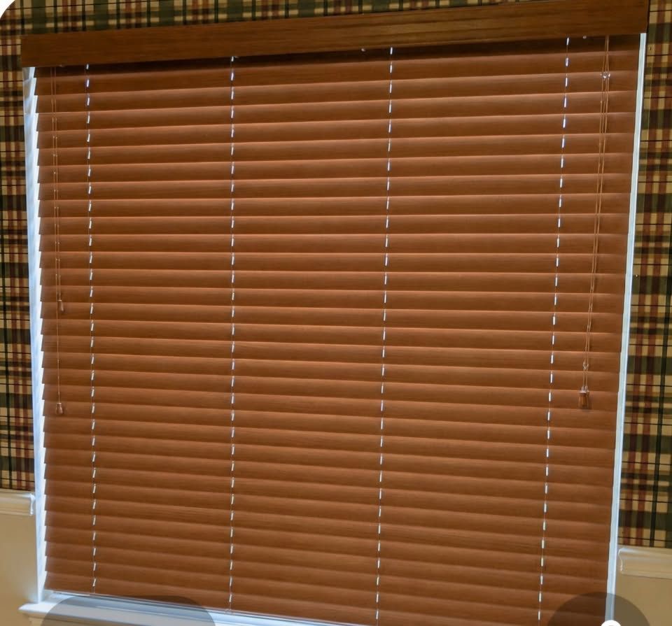 Upgrade your home with these beautiful 2-inch real wood window blinds in excellent condition