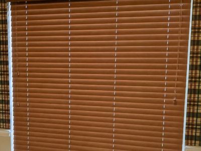 Upgrade your home with these beautiful 2-inch real wood window blinds in excellent condition