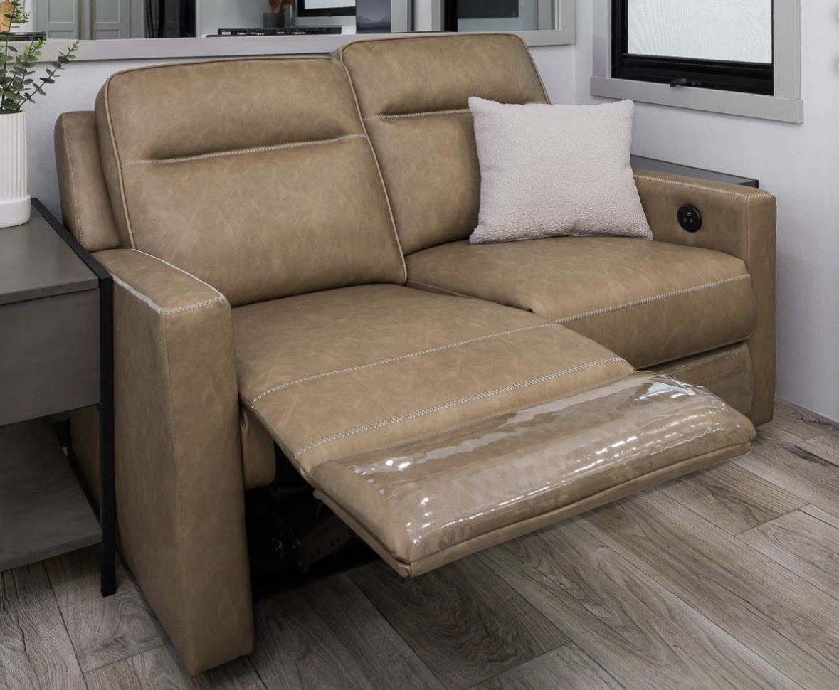 Brand new, never used Brinkley RV Power Reclining Loveseat Tan Faux-Leather with Heat & Massage