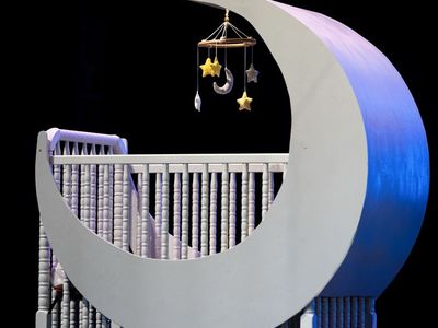 Moon shaped mini crib