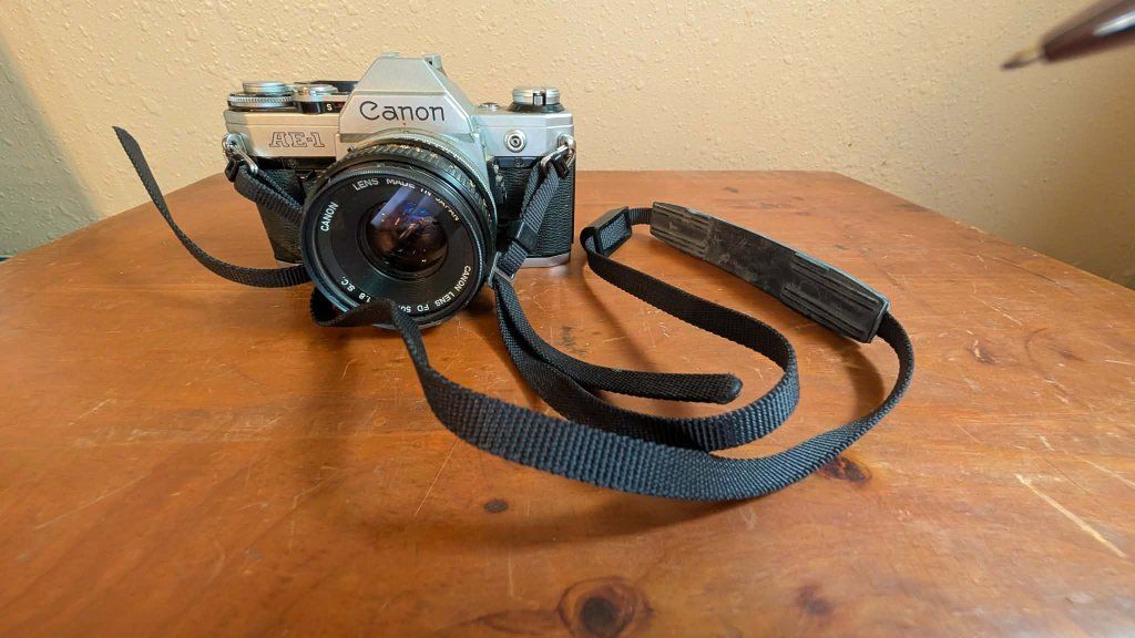 Vintage Canon AE-1 35mm SLR Camera with FD 50mm 1:1.8 SC Lens, Sigma Zoom Lens, Promatic Flash