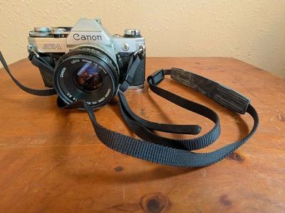 Vintage Canon AE-1 35mm SLR Camera with FD 50mm 1:1.8 SC Lens, Sigma Zoom Lens, Promatic Flash
