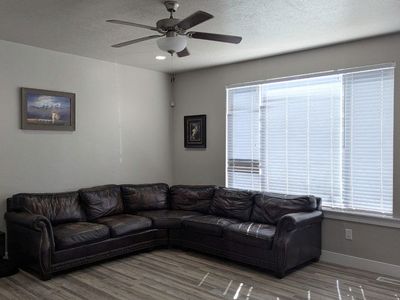 95" Dark Brown Genuine Leather Sectional - Nailhead Trim