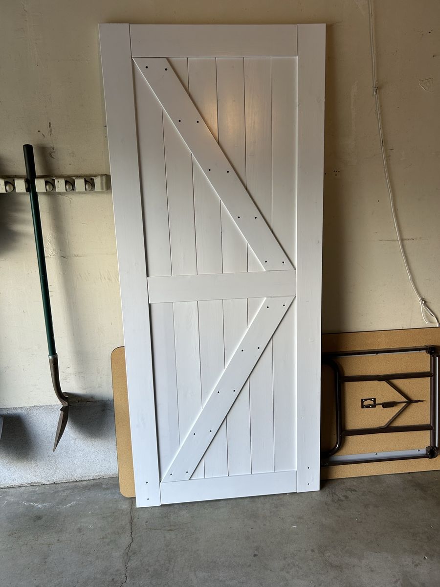 White Interior Sliding Barn Door - Unfinished Wood Panel Design