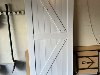 White Interior Sliding Barn Door - Unfinished Wood Panel Design