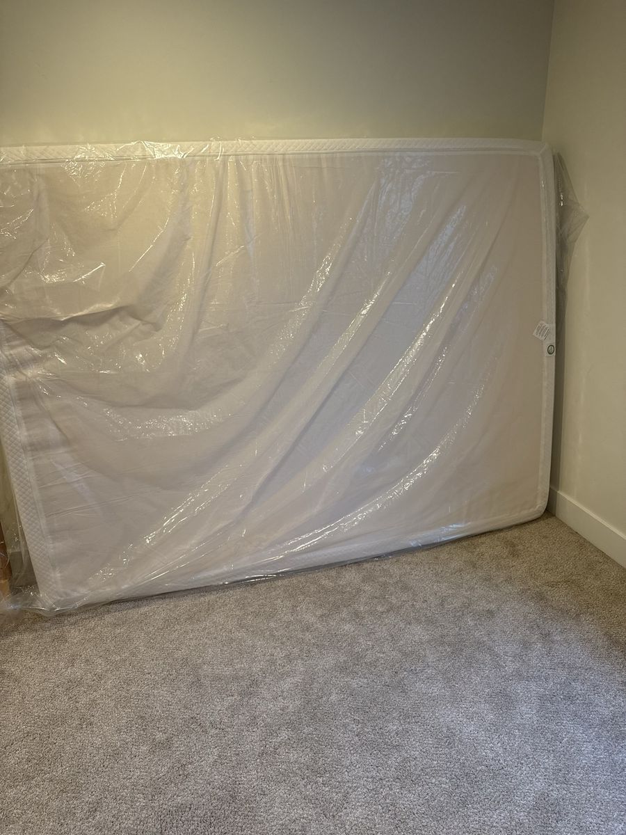 White Memory Foam Mattress Wrapped in Protective Plastic Cover Queen
