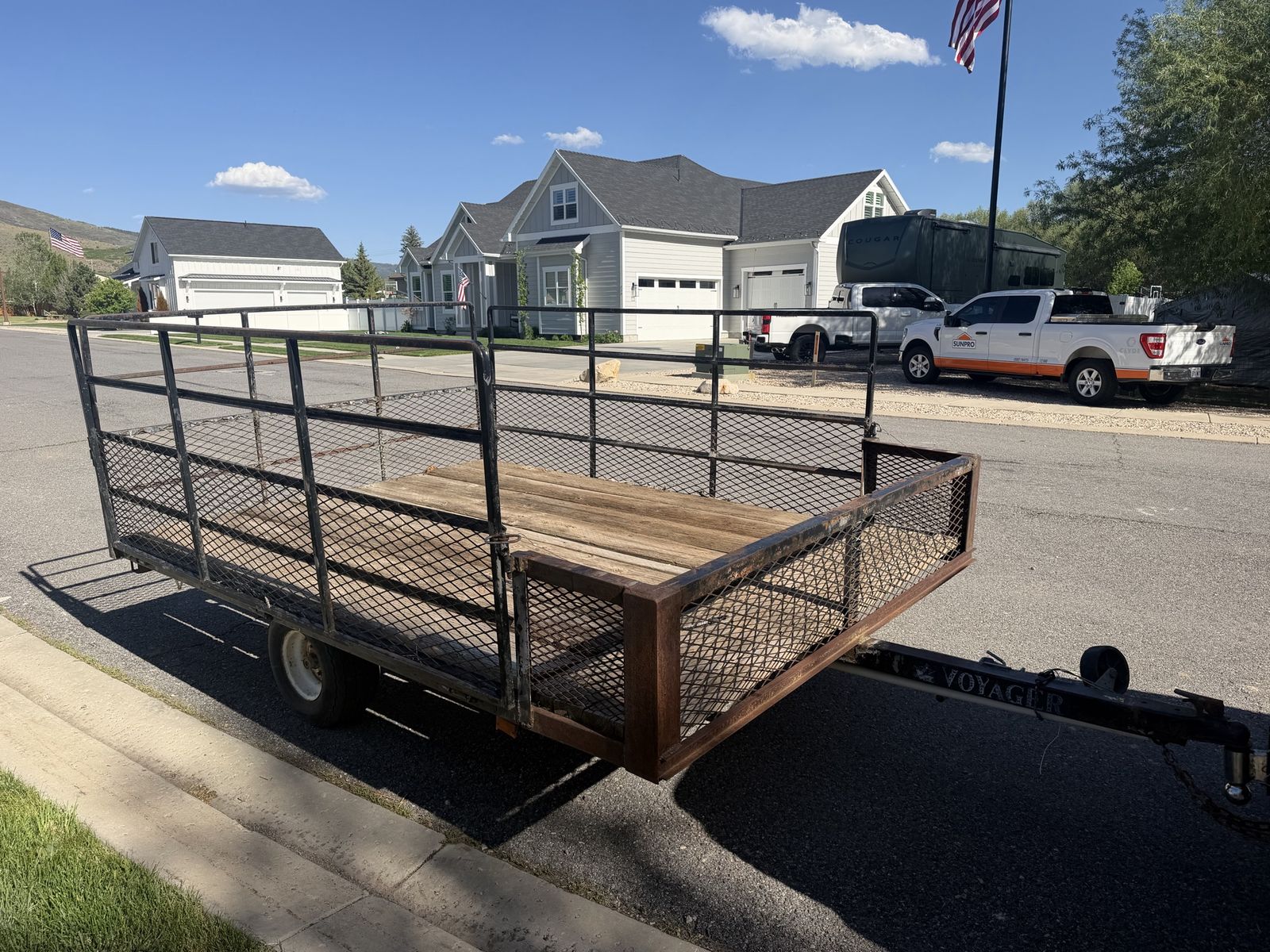Voyager Utility Trailer with Wood Deck and Metal Rails