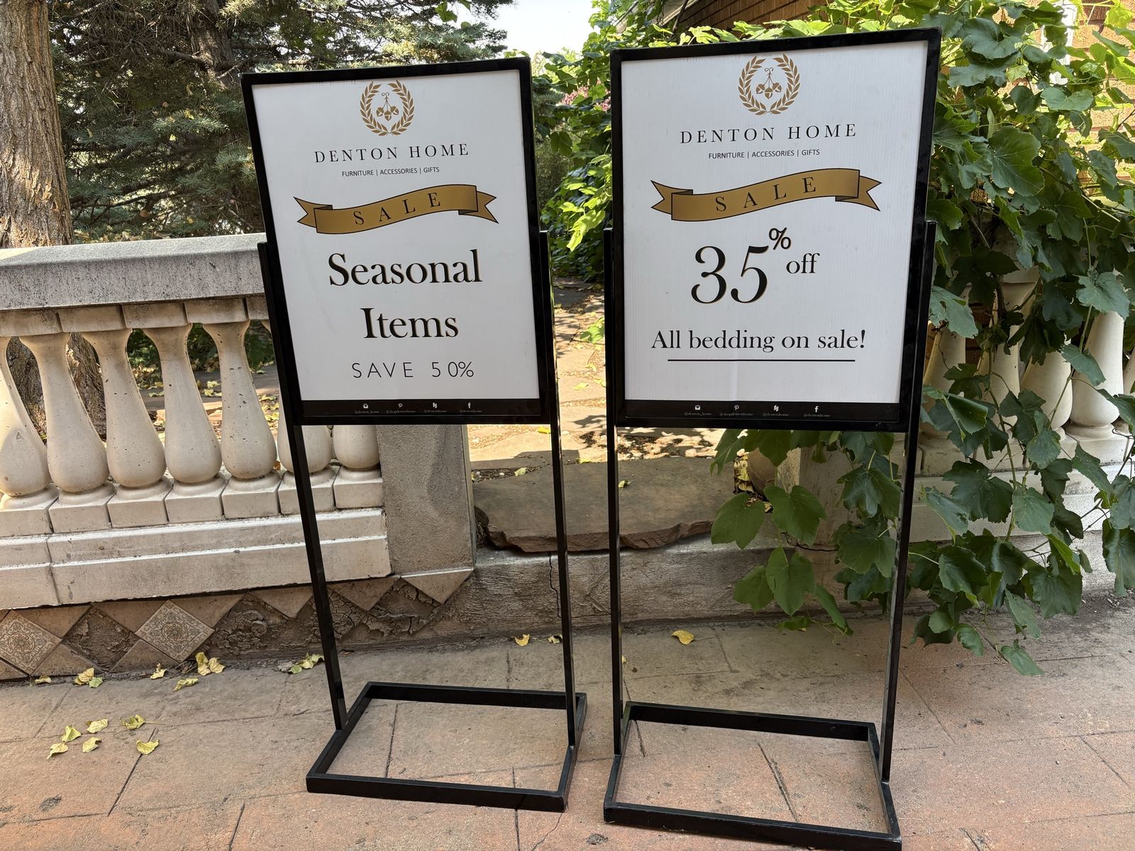 Pair of ULine Black Metal Floor Standing Sign Holders