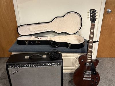Gibson Les Paul Studio Faded + Fender Champion 100 Amp & Hard Case Package
