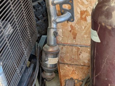 driver's side exhaust manifold and catalytic converter 2004 Nissan Titan