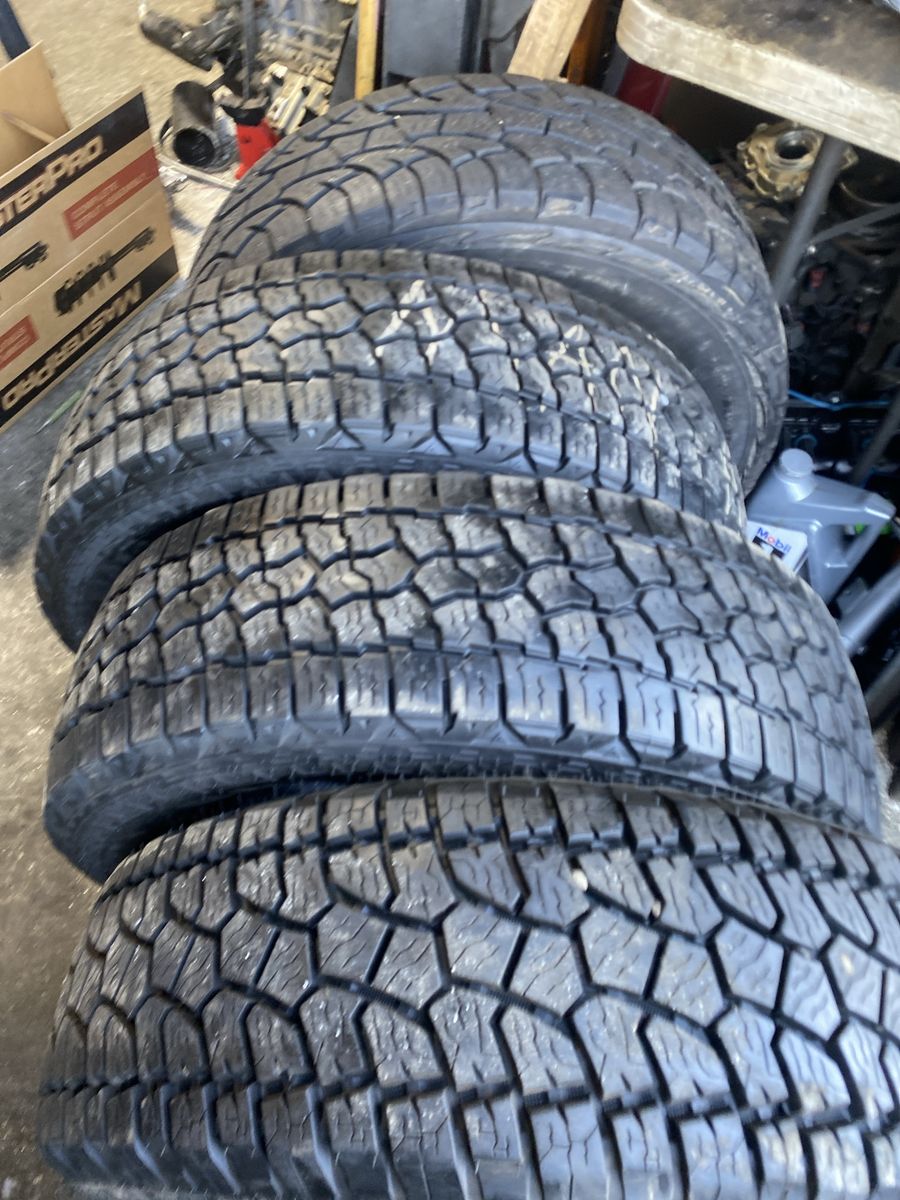 4 TIRES ALL TERRAIN LT275-65R20 95% TREAD LOAD R E