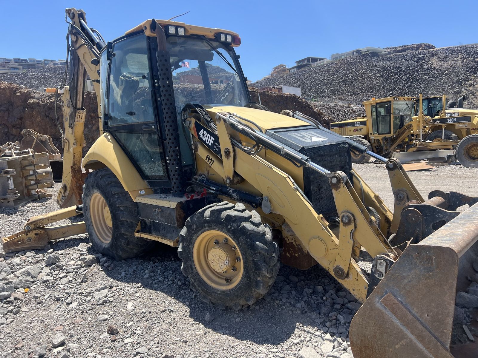Caterpillar 430F2 Backhoe Loader - Yellow Heavy Equipment with Front Loader and Backhoe