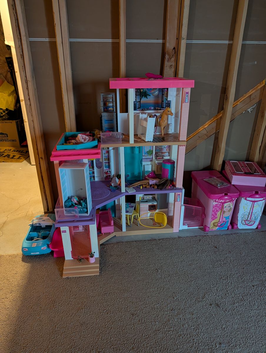 Barbie house and dolls