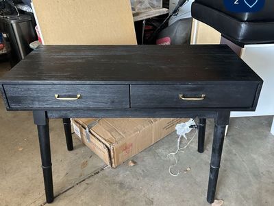 Black desk with drawers