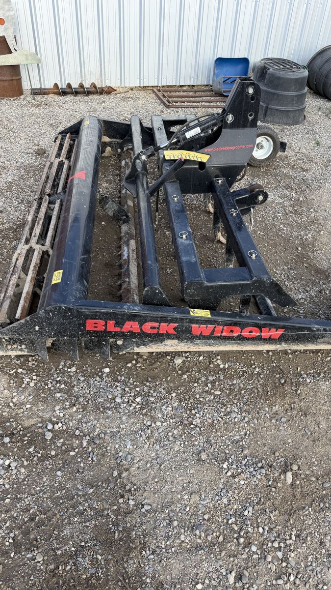 Black Widow arena groomer. Model 9011.