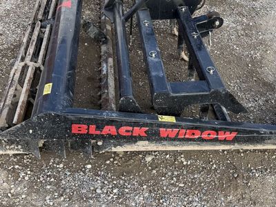 Black Widow arena groomer. Model 9011.