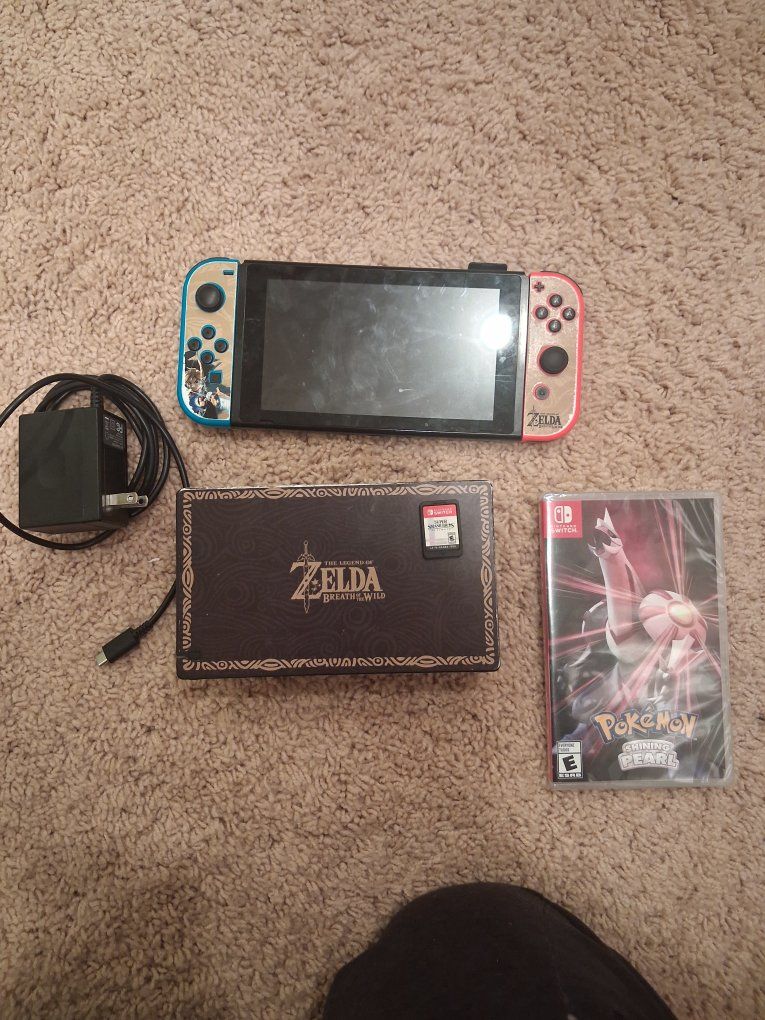 Switch 1 + dock + 2 games