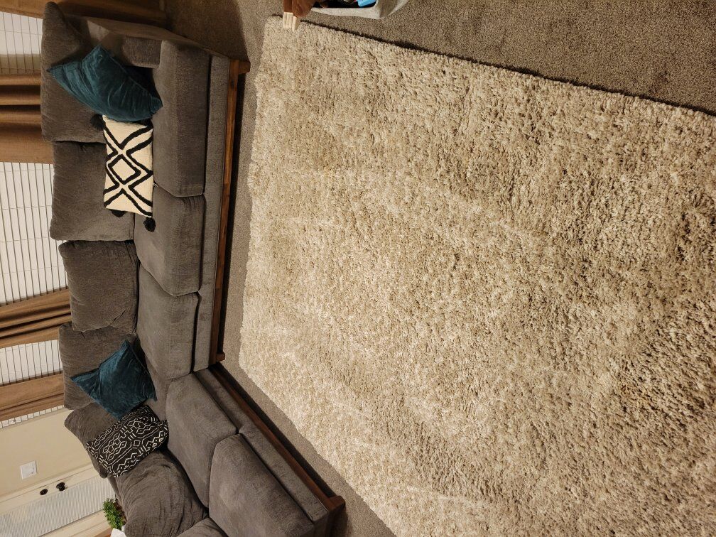 Cream shaggy rug
