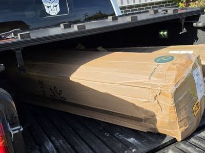 New queen bed still in box